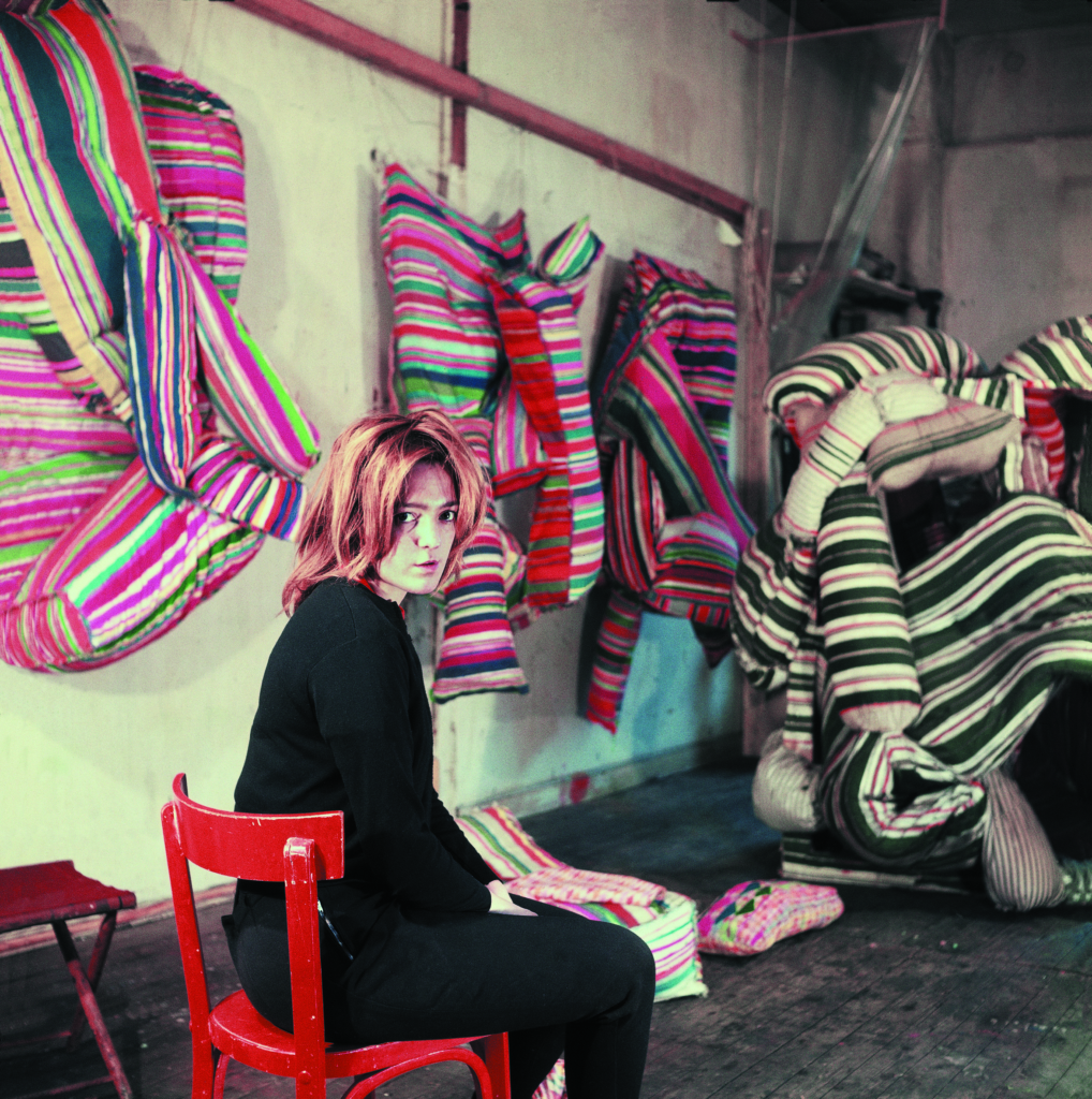 Marta Minujín in Paris, with her first multicoloredmattresses, 1963. Marta Minujín Archive. ©Marta Minujín, courtesy of Henrique Faria, New York and Herlitzka & Co., Buenos Aires.